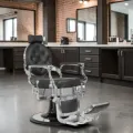 Clovis gold barber chair - luxury barber chair - golden barber chair - vintage barbershop chair - high-end barber furniture - professional hairdressing chair - hydraulic barber chair - upholstered barber chair - robust barber chair - golden design barber chair - luxury retro barber chair - premium barbershop equipment - comfortable barber chair - adjustable barber chair - golden aluminum barber chair