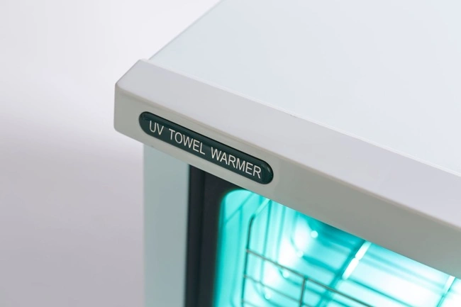 Chauffe‑serviettes professionnel – Stérilisateur UV salon – Chauffe serviette esthétique – Appareil UV désinfection – Chauffe‑serviettes compact – Stérilisateur serviettes UV – Équipement salon de coiffure – Chauffe serviette rapide – Appareil hygiène professionnelle – Chauffe‑serviettes 6,6L