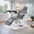 electric gynecological chair – gynecological examination table – professional medical chair – motorized gynecological chair – electric examination chair – ergonomic medical furniture – rotating gynecological chair – electric medical table – adjustable medical chair – gynecological leg rests – swiveling examination chair – gray PU medical chair – high-end gynecological chair – 4-motor medical chair – medical examination table