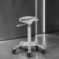 Professional aesthetic stool - Ergonomic beautician seat - Hydraulic treatment stool - Beauty salon furniture - Professional swivel stool - Wheeled massage seat - Manicure pedicure stool - Aesthetic institute equipment - Padded seat stool - High-end aesthetic furniture - Professional hairdressing stool - Wheeled aesthetic stool - Saddle stool - Professional sit-stand seat - Hairdressing and beauty furniture - Ergonomic stool with backrest - Gas lift height adjustment - High-density resilient foam - Chrome star base - Anti-hair casters - Hairdresser cutting stool - Tattoo artist stool - Massage and treatment seat - Manicure and pedicure stool - Washable faux leather upholstery
