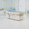 table de spa électrique – table de massage à eau – lit de spa professionnel – mobilier esthétique haut de gamme – table de soin chauffante – table de spa motorisée – lit de massage hydraulique – table de spa avec chromothérapie – mobilier spa premium – table de massage professionnelle