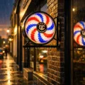 Illuminated barber pole - Rotating LED barber pole - Men's hair salon sign - Barber shop design signage - Waterproof outdoor sign IP44 - Professional facade lighting - Premium round sign - Modern barbershop sign - High-visibility wall sign - VORTEX groupecoiff sign