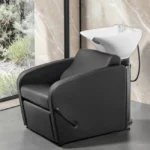 Elsa shampoo basin - ergonomic hairdressing basin - salon washing unit - tilting ceramic basin - compact shampoo basin - professional washing chair - resistant polypropylene structure - adjustable salon seat - premium black washing basin - durable hairdressing equipment - comfortable shampoo basin - hairdressing salon furniture - high-quality washing basin - deep ergonomic basin - modern design shampoo basin