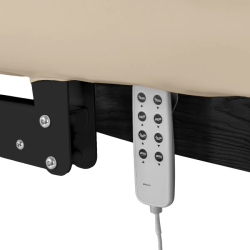 Sillon Relax Beige Bois Noir (8) Sillon Relax care table – electric SPA table – light wood massage table – ergonomic care bed – professional aesthetic table – adjustable spa table – segmented SPA mattress – electric spa table – high-end wellness furniture – stable spa table – premium aesthetic table – tiltable care bed – modern spa table – aesthetic salon equipment – comfortable massage table