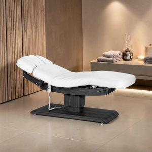 Sillon Relax Blanc Bois Noir (1) Sillon Relax care table – electric SPA table – light wood massage table – ergonomic care bed – professional aesthetic table – adjustable spa table – segmented SPA mattress – electric spa table – high-end wellness furniture – stable spa table – premium aesthetic table – tiltable care bed – modern spa table – aesthetic salon equipment – comfortable massage table