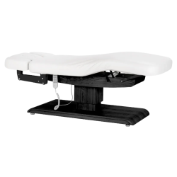 Sillon Relax Blanc Bois Noir (4) Sillon Relax care table – electric SPA table – light wood massage table – ergonomic care bed – professional aesthetic table – adjustable spa table – segmented SPA mattress – electric spa table – high-end wellness furniture – stable spa table – premium aesthetic table – tiltable care bed – modern spa table – aesthetic salon equipment – comfortable massage table