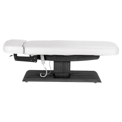 Sillon Relax Blanc Bois Noir (6) Sillon Relax care table – electric SPA table – light wood massage table – ergonomic care bed – professional aesthetic table – adjustable spa table – segmented SPA mattress – electric spa table – high-end wellness furniture – stable spa table – premium aesthetic table – tiltable care bed – modern spa table – aesthetic salon equipment – comfortable massage table