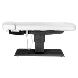 Sillon Relax Blanc Bois Noir (7) Sillon Relax care table – electric SPA table – light wood massage table – ergonomic care bed – professional aesthetic table – adjustable spa table – segmented SPA mattress – electric spa table – high-end wellness furniture – stable spa table – premium aesthetic table – tiltable care bed – modern spa table – aesthetic salon equipment – comfortable massage table