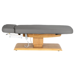Sillon Relax Gris Bois Clair (6).webp Sillon Relax care table – electric SPA table – light wood massage table – ergonomic care bed – professional aesthetic table – adjustable spa table – segmented SPA mattress – electric spa table – high-end wellness furniture – stable spa table – premium aesthetic table – tiltable care bed – modern spa table – aesthetic salon equipment – comfortable massage table