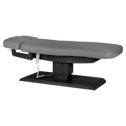 Sillon Relax Gris Bois Noir (5) Sillon Relax care table – electric SPA table – light wood massage table – ergonomic care bed – professional aesthetic table – adjustable spa table – segmented SPA mattress – electric spa table – high-end wellness furniture – stable spa table – premium aesthetic table – tiltable care bed – modern spa table – aesthetic salon equipment – comfortable massage table