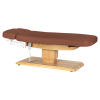 Sillon Relax Marron Bois Clair (5) Sillon Relax care table – electric SPA table – light wood massage table – ergonomic care bed – professional aesthetic table – adjustable spa table – segmented SPA mattress – electric spa table – high-end wellness furniture – stable spa table – premium aesthetic table – tiltable care bed – modern spa table – aesthetic salon equipment – comfortable massage table