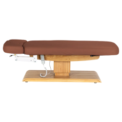 Sillon Relax Marron Bois Clair (6) Sillon Relax care table – electric SPA table – light wood massage table – ergonomic care bed – professional aesthetic table – adjustable spa table – segmented SPA mattress – electric spa table – high-end wellness furniture – stable spa table – premium aesthetic table – tiltable care bed – modern spa table – aesthetic salon equipment – comfortable massage table