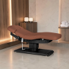 Sillon Relax Brown Wood Black (1) Sillon Relax care table – electric SPA table – light wood massage table – ergonomic care bed – professional aesthetic table – adjustable spa table – segmented SPA mattress – electric spa table – high-end wellness furniture – stable spa table – premium aesthetic table – tiltable care bed – modern spa table – aesthetic salon equipment – comfortable massage table