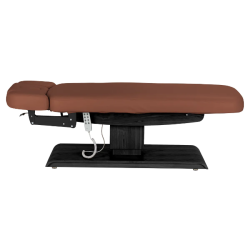 Sillon Relax Marron Bois Noir (6) Sillon Relax care table – electric SPA table – light wood massage table – ergonomic care bed – professional aesthetic table – adjustable spa table – segmented SPA mattress – electric spa table – high-end wellness furniture – stable spa table – premium aesthetic table – tiltable care bed – modern spa table – aesthetic salon equipment – comfortable massage table